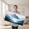 07 - Framed Misty Mountains Watercolor - Panorama Canvas Print - Woman in Living Room.jpg