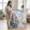 02 - Woman standing in living room with Large Big Bend National Park Watercolor - Square Canvas Print with Natural floater Frame.jpg