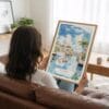 05 - Woman Holding Framed Florida Watercolor Art Print - Vertical.jpg