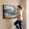 06 - Woman Hanging Colorado Rocky Mountains National Park Watercolor - Panorama Canvas Wall art with Black Floater Frame.jpg