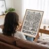 02 - Woman Holding Framed Oklahoma City Art - Pencil Style Art Print - Vertical.jpg