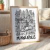 03 - Minneapolis City Art - Pencil Style Art Print with Natural Wood Frame on floor - Vertical.jpg
