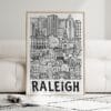 04 - Framed Raleigh City Art - Pencil Style Art Print leaning against couch - Vertical.jpg