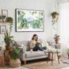 03 - Framed Costa Rica Arenal Volcano Watercolor - Horizontal-36x24 Canvas Print - Boho Living Room with Woman reading.jpg