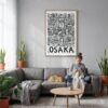 03 - Osaka City Art - Pencil Style Canvas Print with Natural Floater Frame - Woman Knitting on grey couch - Vertical.jpg