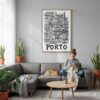 03 - Porto City Art - Pencil Style Canvas Print with Natural Floater Frame - Woman Knitting on grey couch - Vertical.jpg