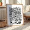 04 - Berlin City Art - Pencil Style Art Print with Natural Wood Frame on floor - Vertical.jpg