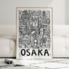 04 - Framed Osaka City Art - Pencil Style Art Print leaning against couch - Vertical.jpg