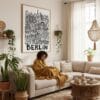 05 - Framed Berlin City Art - Pencil Style Art Print - In Bohi Living Room with Woman reading - Vertical.jpg