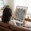 05 - Woman Holding Framed Mumbai City Art - Pencil Style Art Print - Vertical.jpg