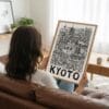 03 - Woman Holding Framed Kyoto City Art - Pencil Style Art Print - Vertical.jpg